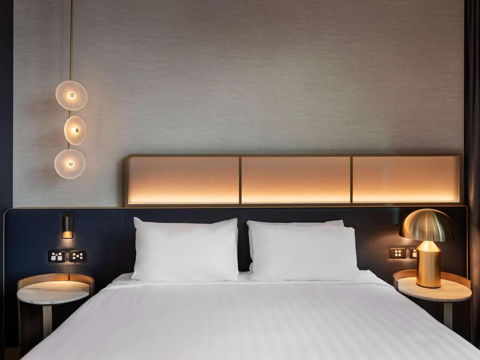 Pullman Auckland Airport 호텔 외부 사진 A bedroom at the hotel